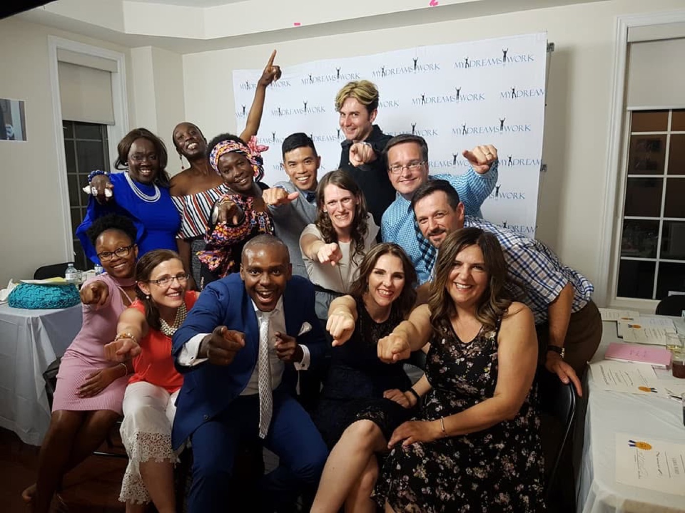Participants celebrating together at a program event